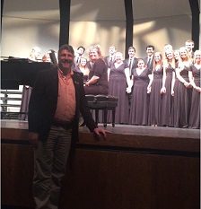 Judge with student group in SHHS Madrigals after their perfect state score